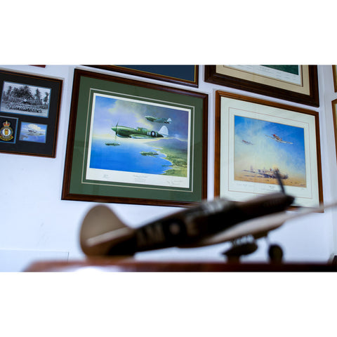 Image of RAAF P40 Kittyhawk Aviation Art Print Looking For Trouble Peter Randall Kent Sir John Gorton Framed on wall model p40 kittyhawk in foreground. A20 Aviation Art